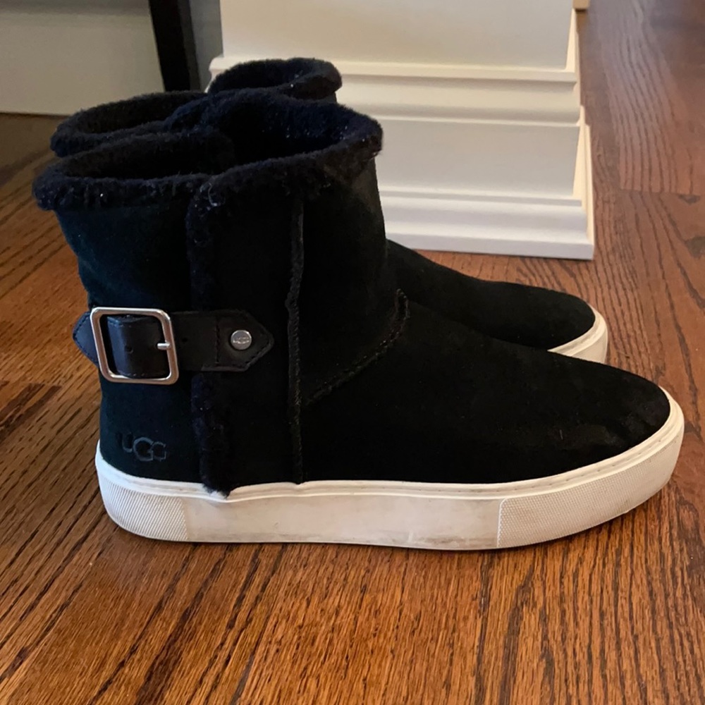 Ugg bootie with buckle detail, rubber sole.  Great condition